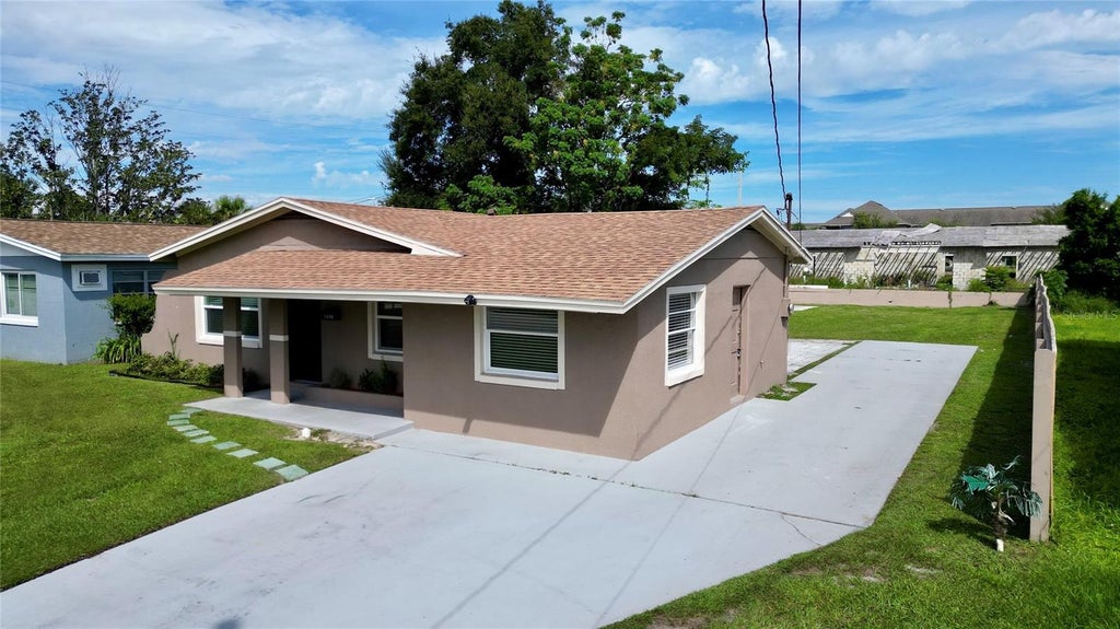 Photo of 2041 W Gore Street, Orlando, FL 32805 (MLS # O6446261)