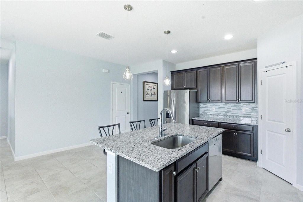 Photo of 488 Meadow Pointe Drive, Haines City, FL 33844 (MLS # S5149434)