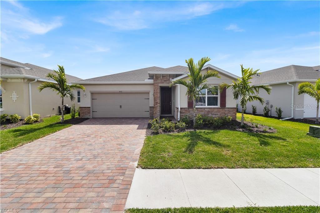 Short Sale. ** Lender Approved Short Sale ****Welcome to your dream home in the coveted gated community of Stonewater, nestled in the heart of Cape
Coral! This pristine, barely-lived-in new construction residence boasts 1816 square feet of modern elegance. Step inside to discover an inviting
open floorplan, perfectly designed for both entertaining and relaxation. Featuring 3 bedrooms and 2 bathrooms, this home offers the ideal
layout with split bedrooms for added privacy. Imagine waking up to the tranquil views of the lake from your own private lanai, where you can
sip your morning coffee or unwind after a long day while soaking in the breathtaking sunsets. Nature enthusiasts will delight in the opportunity
to spot the majestic eagle as it gracefully leaves its nest in the wooded area of this picturesque community. With its prime location and
unmatched beauty, Stonewater is in high demand – act quickly to make this rare gem your own. Don't miss out on the chance to experience the
epitome of luxury living in Cape Coral. Schedule your private showing today and seize the opportunity to call this magnificent property home!