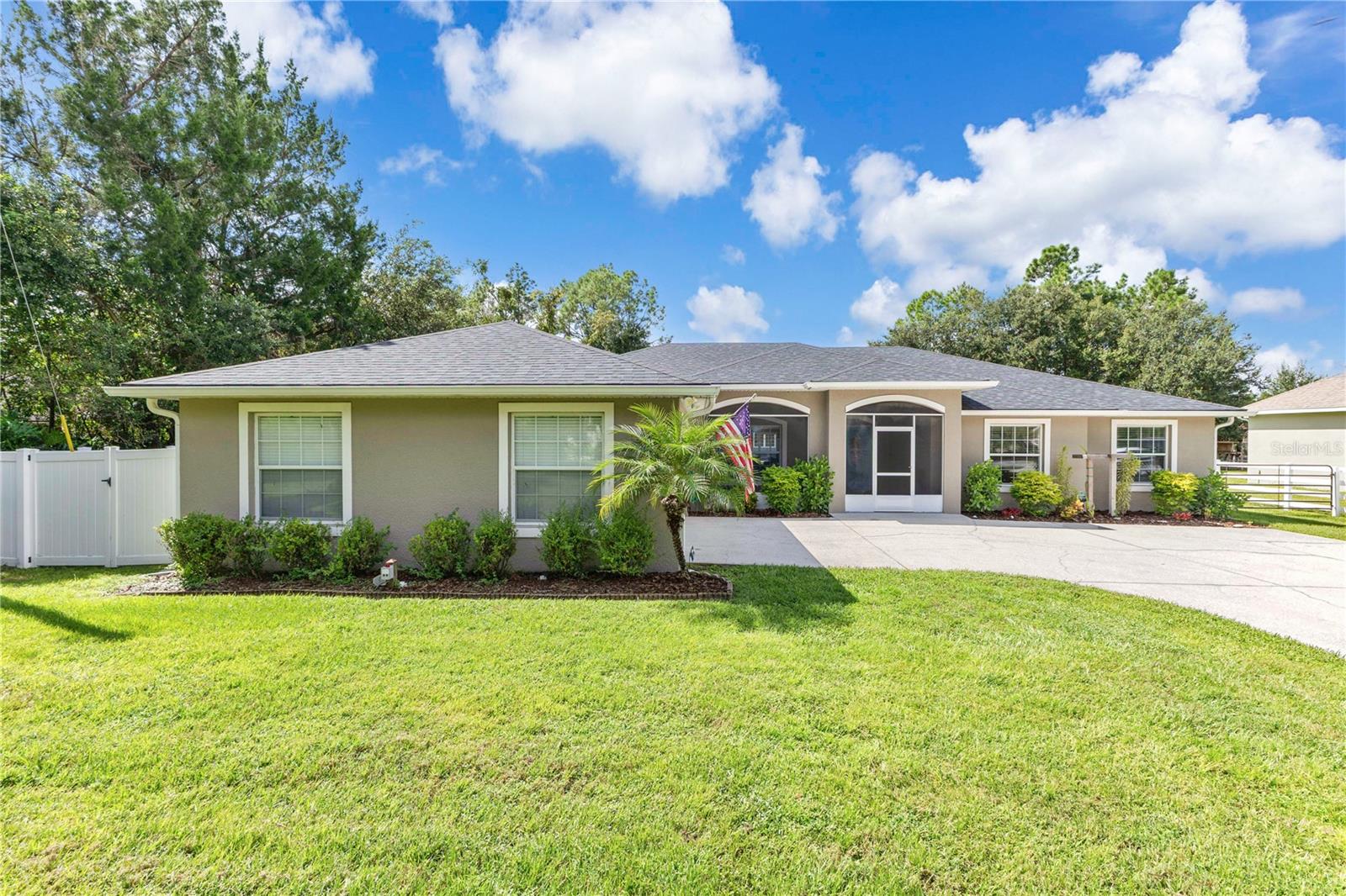 This stunning 4-bedroom, 3-bathroom home sits on a large lot with no HOA and a massive 50x50 enclosed pole barn—perfect for storage, hobbies, or extra workspace.
As you step through the front door, you’ll be greeted by an open formal living and dining area that flows seamlessly into the beautiful kitchen, featuring solid wood cabinets, quartz countertops, and a cozy breakfast nook.
The oversized master suite boasts a spacious walk-in closet, luxurious soaking tub, and separate shower. Three additional bedrooms filled with natural light provide plenty of space for family, guests, or an office.
Step outside and enjoy a screened-in patio overlooking the sparkling new pool (2023)—perfect for relaxation or entertaining. The expansive lot offers plenty of parking and room to spread out.
This home has also been thoughtfully updated for peace of mind and comfort. In 2025, it received fresh interior paint and a new driveway. In 2023, the pool, lanai, and gutters on both the house and barn were installed. Just a year earlier, in 2022, the roof and hot water heater were replaced, the A/C was upgraded to a powerful 5-ton variable speed system, and the 50x50 pole barn was fully enclosed.
With space, upgrades, and freedom, this home truly has it all. Don’t miss your chance to own this beauty—it won’t last long!