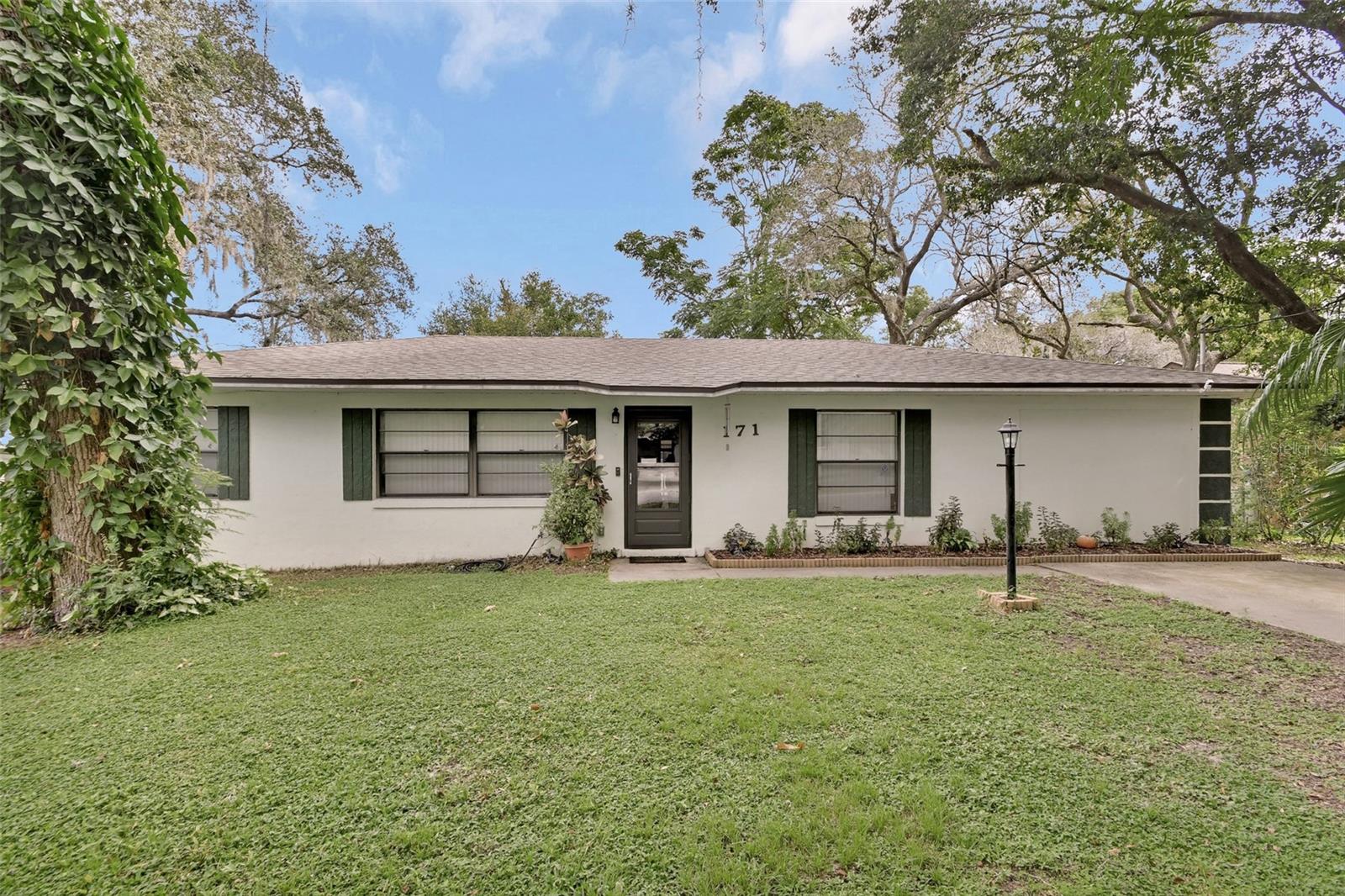 Sellers concession's with negotiated accepted offer. Come check out this 4 bedroom 3 full bath home with updated flooring and split plan design. The converted garage turned into the 4th bedroom with its own separate full bath and water heater would work great for an in-law, guest suite or adult kids. Huge pantry off the kitchen with plenty of kitchen cabinet and counter top space. Updated master bathroom and Brand New Roof! New, Large Deck off the back of the home as well as a work shop with electric. Additional living space in the 11x29 Florida Room fully enclosed and ducted for heat and air. One owner home! located on a dead end street for additional privacy on this property. This home is conveniently located close to shopping, restaurant's, medical facilities and only a 12 min drive to beautiful downtown Deland. Only a 30 min drive to our beautiful sandy beaches and hop on I-4 just a short drive away and head over to Orlando and all the amazing Theme Parks only a 45 min drive away. Give us a call today for your private showing of this well taken care of beautiful home!