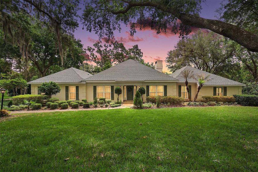 Experience timeless elegance and elevated living in this beautifully updated residence in the desirable Silver Lakes Springs community. Offering 4 bedrooms, 3 full baths, and 2,722 square feet, this home impresses from the start with exceptional curb appeal, mature landscaping, and majestic live oak trees that frame the property. A serene pond view creates a picturesque backdrop, enhancing the home’s sense of privacy and natural beauty.
Inside, a thoughtfully designed open floor plan is complemented by crown molding throughout and a seamless blend of engineered hardwood, tile, and carpet flooring. The heart of the home is the fully renovated kitchen, featuring custom granite countertops, a striking center island, stainless steel appliances, rich wood cabinetry, a walk-in pantry, and a charming kitchen nook just perfect for both everyday living and entertaining. Formal living and dining rooms offer refined gathering spaces, while the spacious family room showcases a cozy wood-burning fireplace and sliding glass pocket doors that effortlessly extend the living area outdoors.
The expansive primary suite serves as a private retreat, boasting a spacious walk-in closet with a custom-built modular closet system and complimented by a spacious en-suite bathroom designed for comfort and relaxation. A guest bedroom with its own en-suite bath provides ideal accommodation for visitors, while two additional guest bedrooms are connected by a well-appointed Jack and Jill bathroom, offering both convenience and functionality.
The screened-in lanai and attached patio create the perfect setting to unwind or entertain while enjoying tranquil pond views. Designed with both luxury and efficiency in mind, this home also includes a 3-zone air conditioning system and solar panels for enhanced energy savings. A rare opportunity to own a meticulously maintained residence that blends classic sophistication with a relaxed, lifestyle-focused design.
Roof replacement was completed in 2021 and the Solar panels installation completed in 2024.
Click the links to watch the Video and 3D interactive tour. 
Schedule your private viewing to tour this amazing property today!