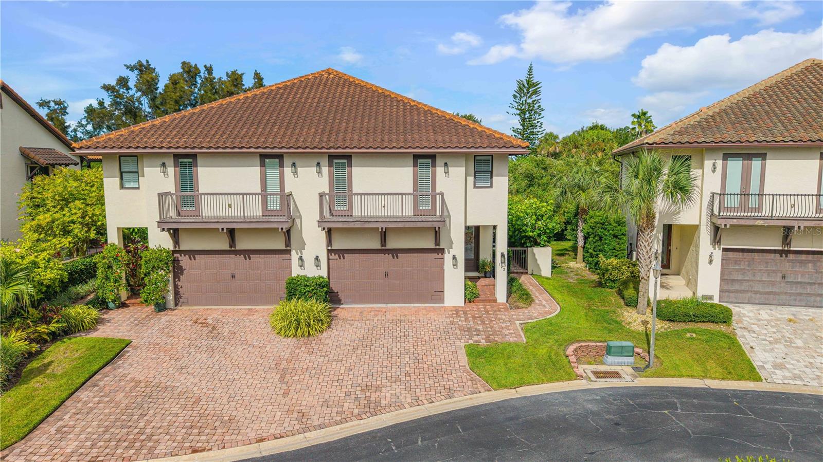 THIS RESIDENCE INCLUDES A 65-FOOT DEEDED BOAT SLIP WITH A 16,000 POUND LIFT AND ROOM TO ADD A FLOATING DOCK FOR JET SKIS OR KEEP THE ADDITIONAL SLIP SPACE FOR A LARGE BOAT, making it a boater’s dream with direct access to the Intracoastal Waterway. All windows and doors are hurricane-rated, and the home features a brand-new AC installed in 2025 for peace of mind. This 2015-built Mediterranean-style townhome sitting in the sought after community of Marina Bay perfectly combines coastal living with modern comfort and convenience. Inside, you’ll enjoy an open, light-filled layout designed for both entertaining and everyday living. The spacious two-car garage provides plenty of storage, with room for both your vehicle and a golf cart—perfect for cruising to the beach or to Flagler Avenue’s boutique shops and popular restaurants. The private backyard retreat is a true highlight, complete with a relaxing spa and pergola, ideal for unwinding after a day on the water. Don’t miss this rare opportunity to own a waterfront community townhome in Marina Bay with a deeded boat slip and lift, close to the sand and the heart of New Smyrna Beach.