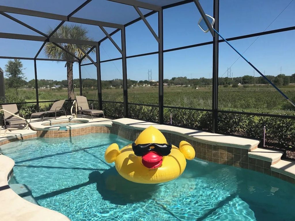 Photo of 4119 Oaktree Drive, Davenport, FL 33837 (MLS # O6375379)