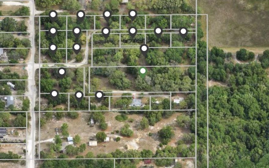Rare opportunity for INVESTORS AND DEVELOPERS in Hudson, Florida. This offering includes 18 VACANT LOTS SOLD TOGETHER AS ONE PACKAGE, all located within the same established neighborhood just minutes from US-19, SHOPPING, DINING, AND THE GULF COAST.

The property was FORMERLY A DEVELOPED COMMUNITY, with much of the groundwork already in place. MULTIPLE WELLS AND SEPTIC SYSTEMS EXIST, and the seller estimates NEARLY $100,000 IN IMPACT FEE CREDITS, providing significant COST SAVINGS AND VALUE-ADD POTENTIAL. The AVERAGE LOT SIZE IS APPROXIMATELY 80’ x 100’, offering flexibility for a variety of site plans and layouts.

Public records reflect RESIDENTIAL ZONING, permitting SITE-BUILT AND MODULAR HOMES, with the potential for ACCESSORY DWELLING UNITS (ADUs) ON EACH LOT. This creates strong opportunities for LONG-TERM RENTALS, MULTI-UNIT INCOME STRATEGIES, OR A TINY HOME COMMUNITY, a housing trend that continues to see STRONG DEMAND.

Ideal for a MOBILE OR MODULAR HOME COMMUNITY, TINY HOME VILLAGE, TRADITIONAL RESIDENTIAL BUILD-OUT, OR MIXED-USE RESIDENTIAL CONCEPT. This property offers SCALE, INFRASTRUCTURE, AND LOCATION that are increasingly difficult to find.

Hudson continues to experience STEADY GROWTH, and opportunities like this—MULTIPLE CONTIGUOUS LOTS SOLD AS A SINGLE INVESTMENT PACKAGE WITH EXISTING UTILITIES AND IMPACT FEE CREDITS—are RARE IN TODAY’S MARKET.

OWNER FINANCING AVAILABLE WITH APPROXIMATELY 50% DOWN FOR QUALIFIED BUYERS. SELLER MOTIVATED — BRING OFFERS.

Buyer to verify all zoning, density, usage, and development options through PASCO COUNTY.