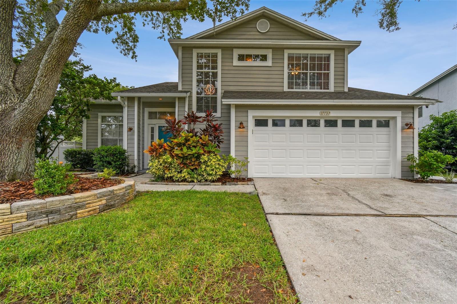 Welcome to this beautifully maintained 3-bedroom, 2.5-bath, 2-car garage home, nestled on a prime lot in the sought-after guard-gated community of Hunter’s Green. With tranquil lake views and a backdrop of the Flatwoods Preserve, this property offers peace, privacy, and a rare connection to nature.
Step inside to find soaring high ceilings, bamboo wood flooring, and fresh paint throughout the main living areas. The primary suite is conveniently located downstairs, featuring vaulted ceilings, a walk-in closet, and a beautifully updated en-suite bath with granite countertops, his and her sinks, and ample storage.
The kitchen has been thoughtfully updated with granite countertops, LED lighting, modern appliances, a deep sink, and keyless entry—creating a stylish and functional space for everyday living and entertaining.
Upstairs, you’ll find two generously sized bedrooms with plush carpeting, a full bath, and plenty of storage throughout. Enjoy relaxing evenings on the screened patio, taking in serene lake and preserve views—a daily reminder of the beauty that surrounds you.
Residents of Hunter’s Green enjoy 24/7 security, miles of walking trails, tennis, parks, playgrounds, and optional membership to the Tom Fazio-designed golf course, fitness center, pool, and clubhouse.