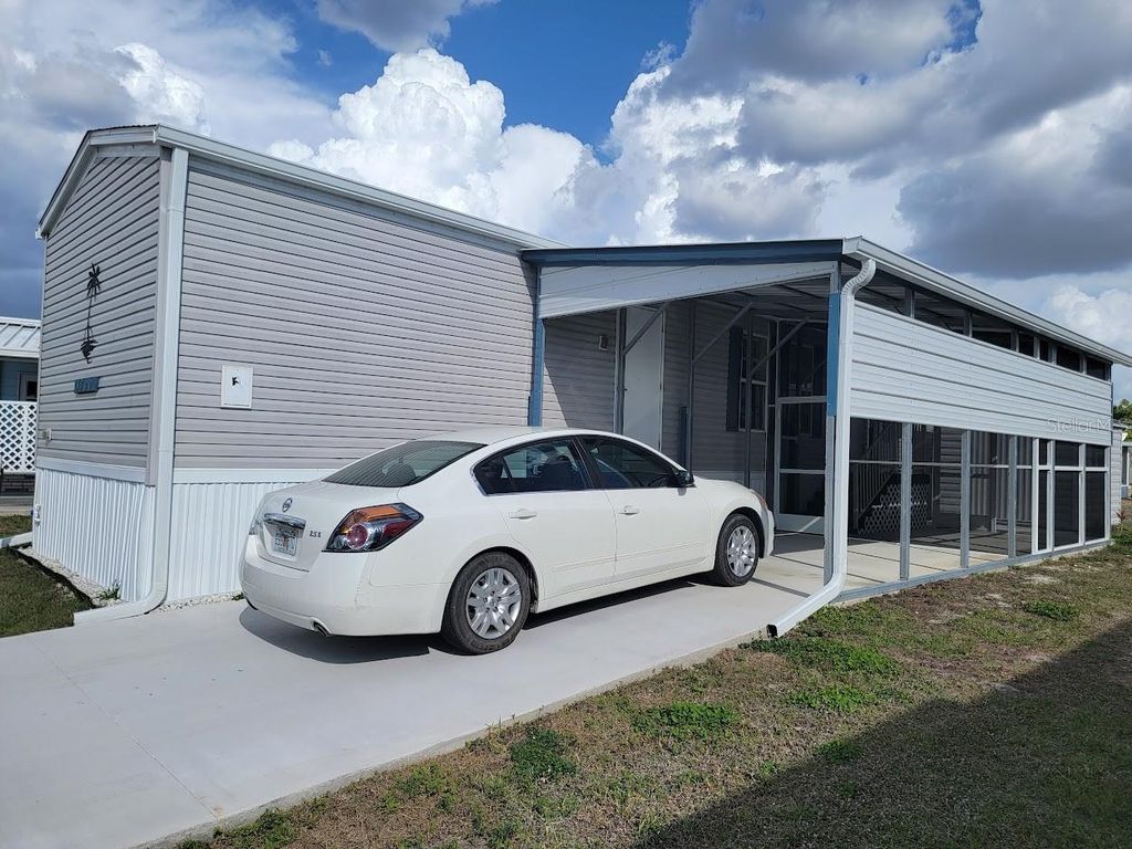 Photo of 5700 Holiday Park Boulevard, North Port, FL 34287 (MLS # A4685317)