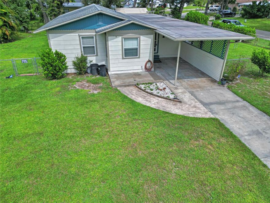 JUST REDUCED!!! Welcome to this charming 3-bedroom, 1 bathroom home situated on a desirable corner lot! This property boasts plenty of natural light, ample space and a range of upgrades. Exterior features include a new impact-resistant aluminum front door and windows (2024), fully fenced yard with pedestrian and double gate access, 2 sheds, clusia plant hedging for privacy, tankless gas water heater, carport and multiple exterior outlets. The Vivint security system is transferable to the buyer. Inside, enjoy all new PVC plumbing (2023), updated AC system (2023) with supply and return vents, faux wood blinds, crown molding, window and door casings, hardwood floors, gas stove, kitchen tile countertops and stainless-steel appliances. The bathroom has been completely updated, and the washer and dryer are included! Schedule your private showing today and make this house your home!