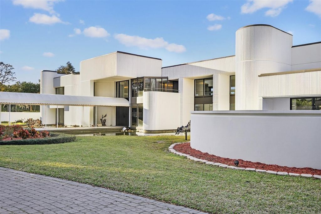 Photo of 812 Sweetwater Club Boulevard, Longwood, FL 32779 (MLS # O6370385)