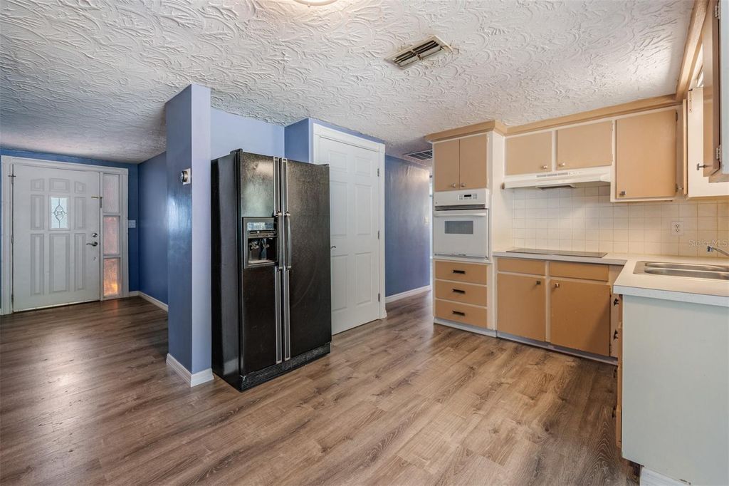 Photo of 5301 Dawn Lane, Holiday, FL 34690 (MLS # TB8438099)