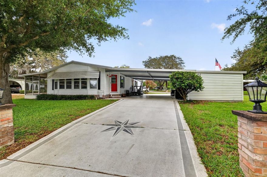 MOTIVATED SELLER!!!  Bring your OFFERS!! Come and see this NEWLY RENOVATED and SPACIOUS manufactured home boasting a whopping
1650+ SQFT of WELL-DESIGNED LIVING SPACE and start LIVING THE VILLAGES FLORIDA LIFESTYLE!!  OVER $25,000 in UPGRADES!  This hidden gem features FRESH NEW PAINT in all the interior, a BRAND NEW DISHWASHER, OVEN, COOKTOP, KITCHEN FAUCETS, CEILING FANS, EXHAUST FANS, EXTERIOR LIGHTS and 2 COMFORT HEIGHT TOILETS, a BRAND NEW ELECTRICAL PANEL, all new UNDERSTRAPPING & VAPOR BARRIER, and a BRAND NEW ST. AUGUSTINE SODDED YARD, IRRIGATION CONTROLLER & SPRINKLER HEADS!  This LARGE .25 ACRE CORNER LOT is situated on a desirable CUL-DE-SAC with a PULL-THROUGH PAINTED DRIVEWAY for ease of entry/exit. The home has LAMINATE FLOORING THROUGHOUT and features two SPACIOUS BEDROOMS, each with their own private baths (perfect for comfort and privacy). The primary bedroom is VERY LARGE with a WALK-IN CLOSET, and a LARGE WALK-IN SHOWER W/GRAB BARS & BENCH (updated in 2020). The 2nd bedroom has its own closet with tub/shower combo. The laundry room is located inside, right off the kitchen. The Dining area is connected to the kitchen, overlooking a SPACIOUS STEP-DOWN CLIMATE CONTROLLED FLORIDA ROOM with many windows to bring in a lot of NATURAL LIGHT. This home has 2 carports, (1 carport is large enough for 2+ cars, and the other carport was converted to a LARGE SCREENED IN LANAI with its own private entrance into the house. This home features 3 entrance doors and a LARGE STORAGE SHED (Big enough for a golf cart, riding lawn mower, tools/lawn equipment and many of your toys)! Metal Roof 2011, A/C 2017. Note:  Previous owner said there is an Invisible dog fence on the property.