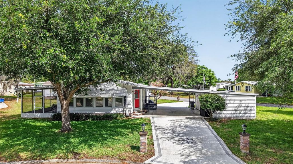 Photo of 705 Devon Drive, Lady Lake, FL 32159 (MLS # G5110824)