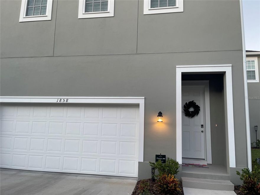 This like new one bedroom garage apartment in Celebration Island Village is beautifully furnished.  Luxury vinyl plank flooring throughout, full size washer & dryer, nice size kitchen with all full size appliances.  Plantation shutters on all windows, quartz countertops, 42 inch cabinets and upgraded tile in the bathroom.  Water, electric, gas & internet are all included.  No pets and on street parking.  Just a block away from Island Village pool, fitness center and clubhouse.  Island Village is a short drive to the new Celebration Point shopping area with Publix that has just opened and many additional restaurants and shops due to open soon.  All Disney Parks & Disney Springs is a short drive away.  Come & live in Celebration's newest village, Island Village!