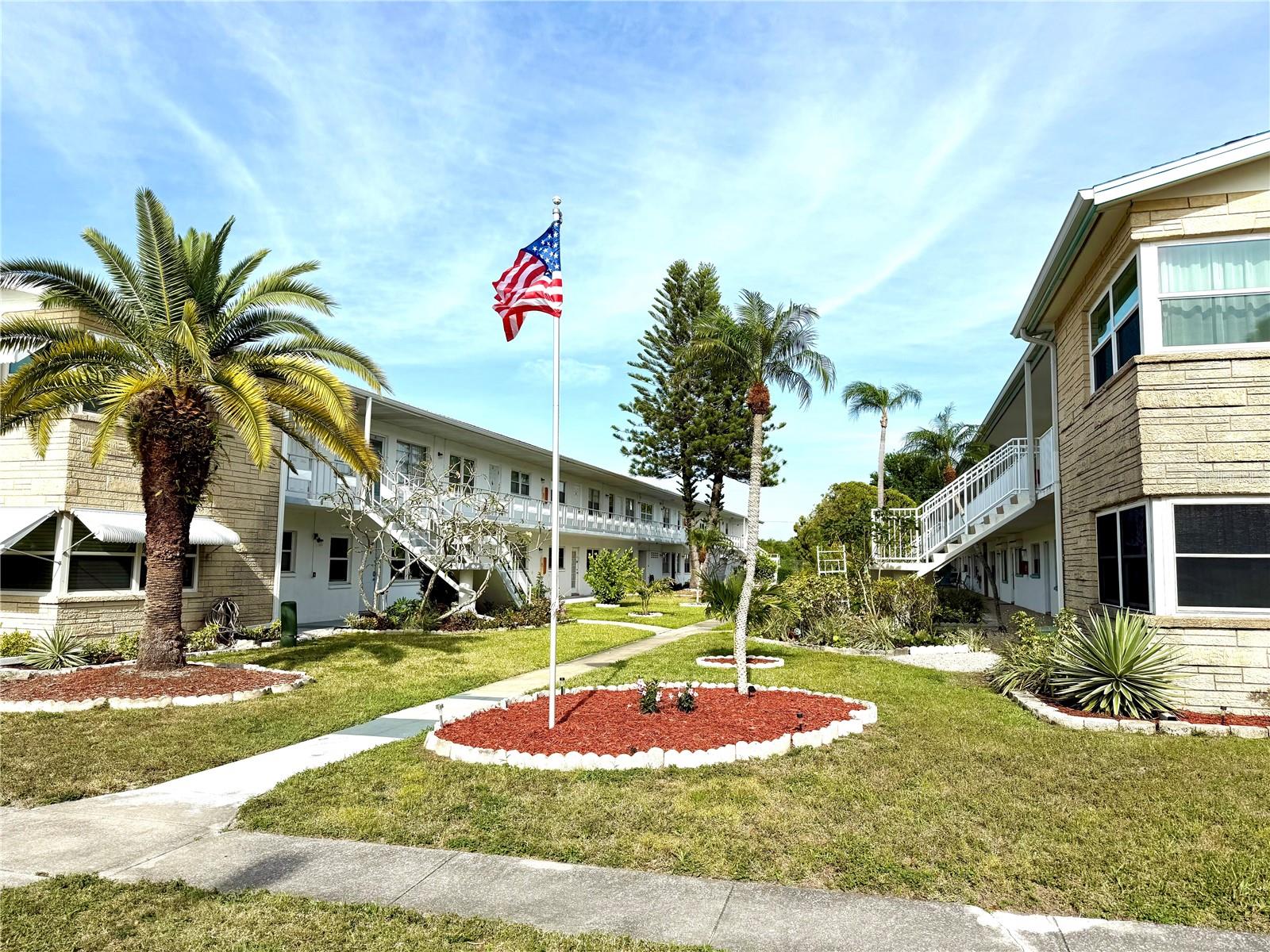 Extremely affordable 1 bedroom/ 1 bathroom + Florida room condo is in the desirable and very active 55+ community. The Florida room (not included in the square footage) is great flex space - office, crafts, music, or guest bedroom. Great property for snowbirds or full-time residents. It’s offered partially furnished by a motivated seller who is open to negotiating a fair price. The monthly HOA fee ($400) covers all essential utilities and building services – natural gas, water, sewer, trash, Cable TV, exterior building maintenance, grounds maintenance, and building insurance. You only pay your electric bill and property taxes. Extremely affordable living! The community has great facilities and numerous activities – walking trails, heated swimming pool, library, billiard room, recreation center, shuffleboard, horseshoes, bingo, card games, dancing, exercise classes, and holiday dinners. The building is made of concrete block and has a metal roof. No damage was sustained from either hurricane in 2024. Not in a flood zone. Assigned parking with guest parking. Grocery store, shopping, and restaurants within a 5-minute walk. Laundry facilities are available in the building. Management office by pool for easy access. Very well-maintained community.