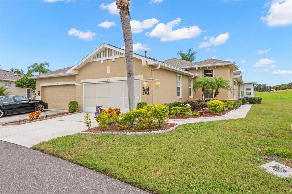 Photo of 2057 Inverness Greens Drive, Sun City Center, FL 33573 (MLS # TB8554271)
