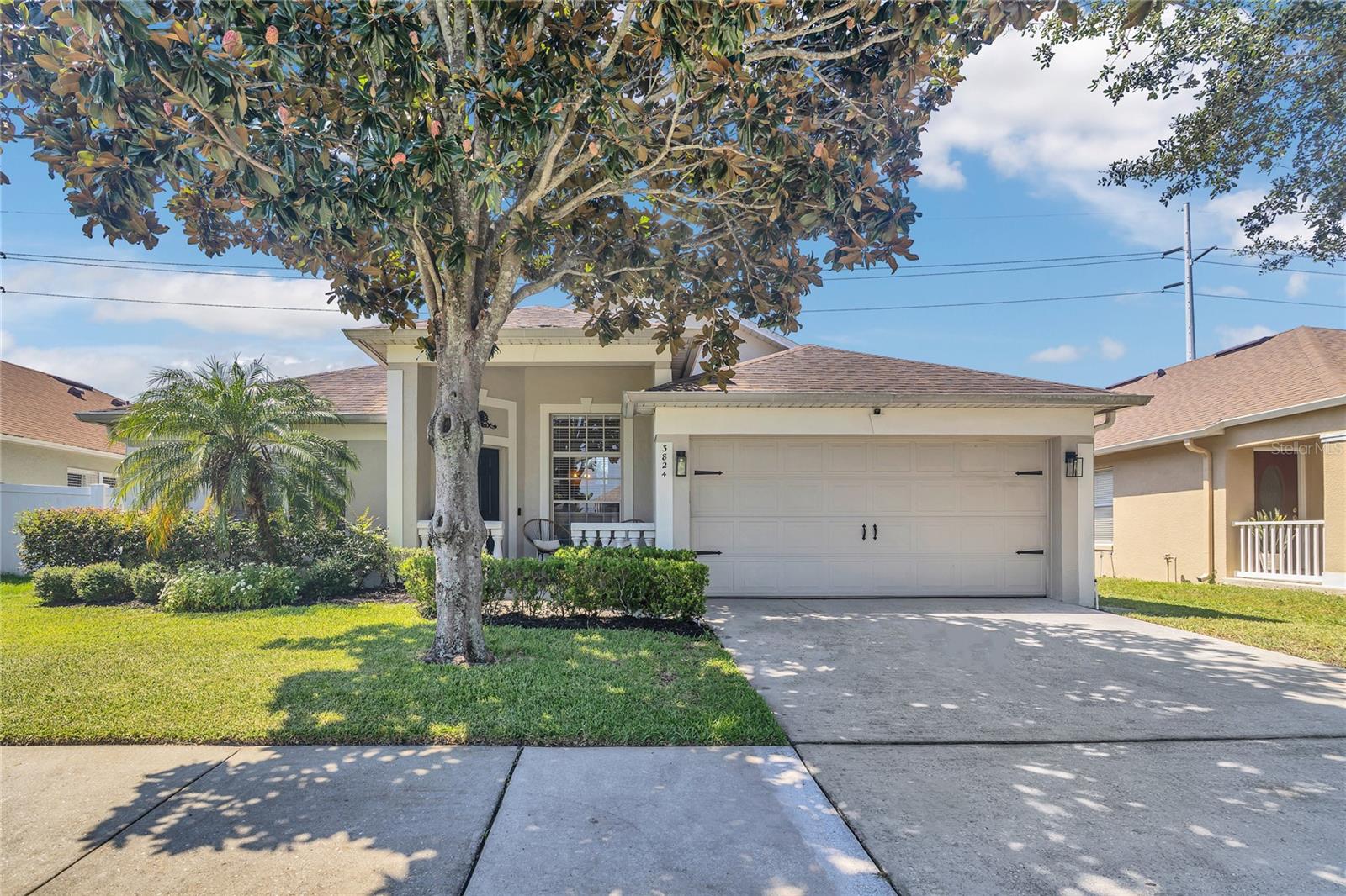 Welcome to 3824 Lake Warren Dr, located in the desirable gated Crescent Park community. This move in ready home features a updated guest and master bathroom, master walk in closet, modern kitchen upgrades, and fresh paint throughout. Inside the 4 bedroom, 2 bath home, you have nearly 2,000SqFt of functional living space with vaulted ceilings and an open living and dining layout. Sliding glass doors flood the space with natural light and provide convenient access to the backyard. The kitchen boasts plenty of counter space, cabinets, and a custom breakfast nook. With 4 bedrooms, you have flexibility for a home office or study. The primary suite shares direct access screened in porch and outdoors via sliders. Set on a quiet street across from a Lake Warren Park, you’ll enjoy easy access to tennis courts, playgrounds, picnic areas, and peaceful lakefront relaxation. Minutes from Orlando International Airport, downtown amenities, and beautiful Lake Conway!