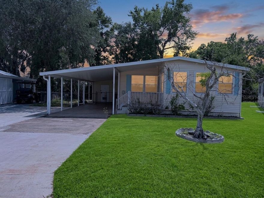 (Check out the Virtual Tour)

Discover the potential in this 2-bedroom, 2-bathroom manufactured home situated on a spacious 7,471 sq ft lot in Lakeland. Offering 1,152 sq ft of living space, this single-story home provides a functional layout, generous room sizes, and excellent potential for personalization or investment.

The home features multiple living areas, including a bright front sitting room filled with natural light and a spacious main living room with durable wood-look flooring throughout. A dedicated dining area sits just off the kitchen, creating a comfortable flow for everyday living and entertaining.

The kitchen offers ample cabinet storage, countertop space, and a practical layout with direct access to the exterior and covered carport—ideal for convenience and easy unloading. Both bedrooms are generously sized, including a large primary suite, while two full bathrooms provide flexibility for guests or shared living.

Additional interior features include built-in cabinetry and shelving, ceiling fans, and central heating and air conditioning for year-round comfort.

Outside, the property includes an extended covered carport and a large driveway with plenty of parking space. The lot provides room for outdoor enjoyment, landscaping upgrades, or additional improvements to suit your needs.

Built in 1977 with metal siding and a central heat pump system, this home offers solid fundamentals and is move-in ready with the opportunity to update over time, making it ideal for homeowners or investors seeking value-add potential.

Property Highlights:
 • 2 Bedrooms | 2 Full Bathrooms
 • 1,152 Sq Ft Living Area
 • 7,471 Sq Ft Lot (56 x 109)
 • Manufactured Home | Single Story
 • Central Air & Heat Pump
 • Covered Carport + Extended Driveway
 • Multiple Living Areas + Dining Space
 • Built-in Storage Features Throughout

Whether you’re looking for a primary residence, rental property, or a project to make your own, this home presents a strong opportunity in a convenient Lakeland location.