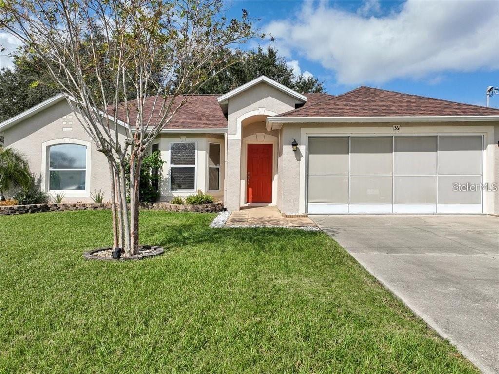 Photo of 36 Firethorn Lane, Palm Coast, FL 32137 (MLS # FC321025)