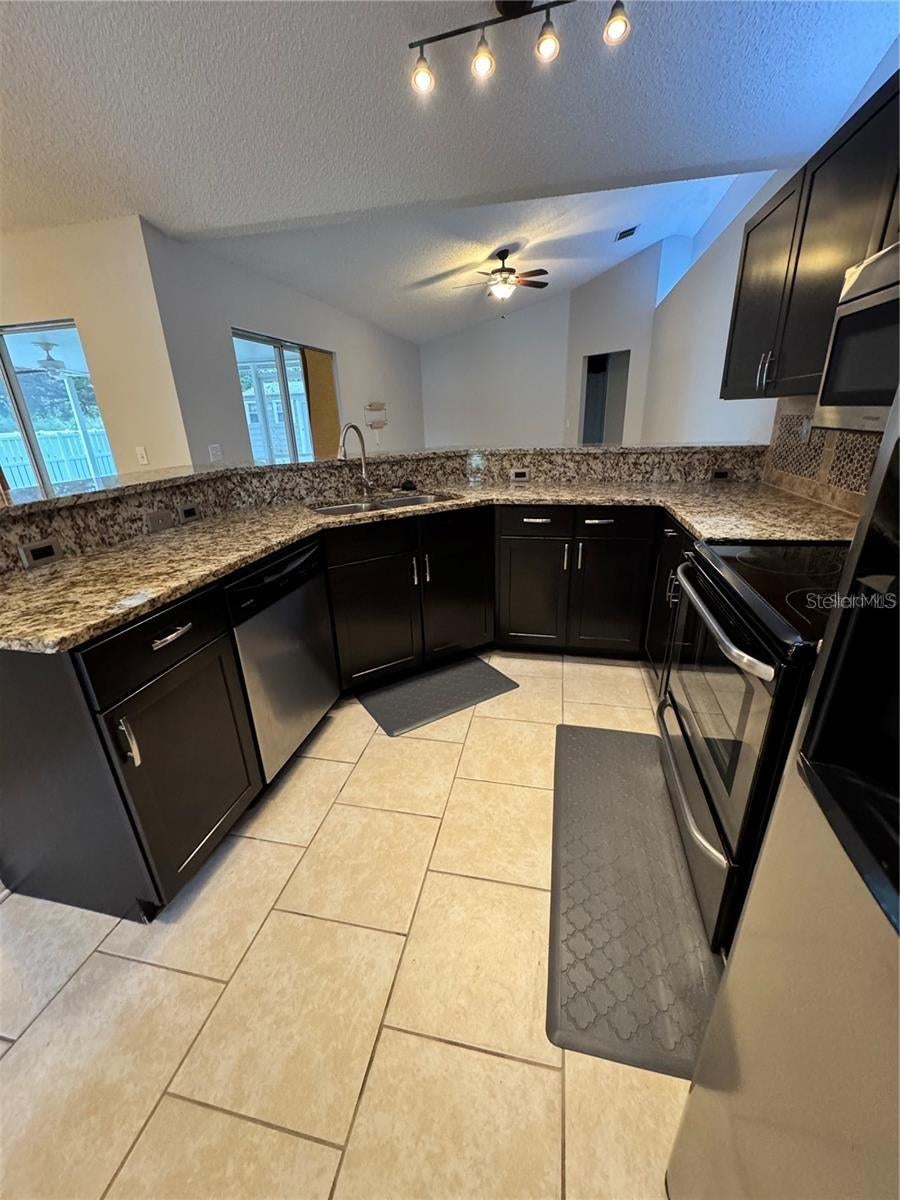 Photo of 36 Firethorn Lane, Palm Coast, FL 32137 (MLS # FC321025)