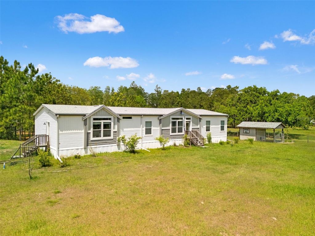 Photo of 12048 Sherington Pl, Groveland, FL 34736 (MLS # G5111465)