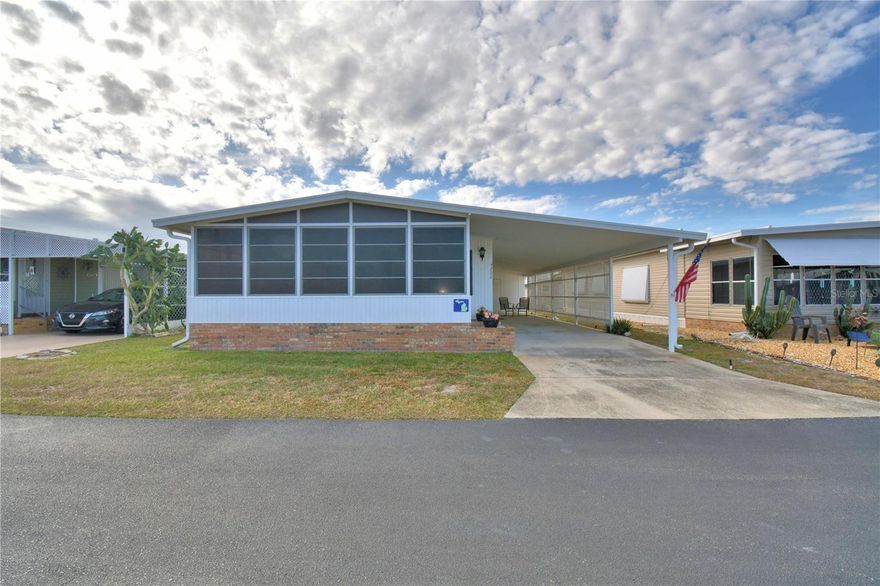 Move right into this very well maintained home.  This home features some new vinyl flooring and newer windows.  The hall bathroom has been upgraded with a new vanity and flooring.  The home has had new plumbing installed in 2025 including a new water heater and washing machine. Just pack your bags and move right into this fully furnished home.   Oakwood Estates, a 55+ community offers many amenities and activities.  You can be as busy and join all the activities or just sit back and enjoy the peaceful community.