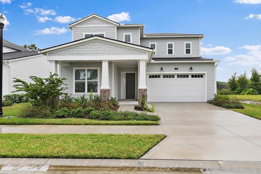 Welcome home to this spacious two-story residence in the heart of Palm Coast. This four-bedroom, four-bath home offers a flexible layout ideal for a variety of living arrangements. Two bedrooms with full bathrooms are located on the main level, providing convenience for guests or multigenerational living. Additional ensuite bedrooms and flexible living space are located upstairs. The open-concept main living area connects the kitchen, dining, and living rooms, creating a functional flow for everyday living and entertaining. The kitchen features ample cabinetry and counter space. Generously sized rooms, a practical layout, and ample storage throughout enhance comfort and usability. Located in a family-friendly neighborhood close to schools, parks, shopping, and dining. Convenient access to local amenities makes this home well suited for today's lifestyles.