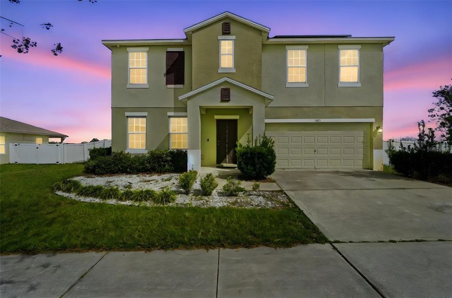 One or more photo(s) has been virtually staged. Nestled on a sprawling .4-acre corner lot in the desirable Eagle Pointe community, this 4-bedroom, 2.5-bathroom home offers a lifestyle defined by space, sustainability, and serene scenery. The heart of the home is an expansive chef’s kitchen featuring granite countertops, an ornate backsplash, soft-close cabinetry, and stainless-steel appliances with a dual oven—all designed to overlook peaceful views of Cherry Lake. This open-concept space flows seamlessly into the dining area and family room, leading out to a covered rear sitting area and a massive, vinyl-fenced backyard with plenty of room for the pets to roam. The thoughtful layout includes two distinct living areas and a versatile 15’ X 11’ upstairs loft ideal for a home, play space, office or library. The generous 20’ X 14’ primary suite serves as a private retreat with captivating vistas of the Clermont Chain of Lakes, complete with an ensuite bath featuring a large walk-in closet, garden soaking tub, walk-in shower, and dual-sink vanity. Beyond aesthetics, this home is engineered for efficiency with SOLAR PANELS that will be COMPLETELY PAID OFF at closing, keeping those electric bills down. This home needs a little love, and a little elbow grease will go a long way to making this incredible opportunity shine like a new diamond! Located just a short ride from South Lake High, shopping, and dining, this property offers more than just a convenient location—it provides immediate access to the world-class boating, fishing, and recreation that make Groveland one of Central Florida's most sought-after destinations. All measurements are approximate and should be independently verified.