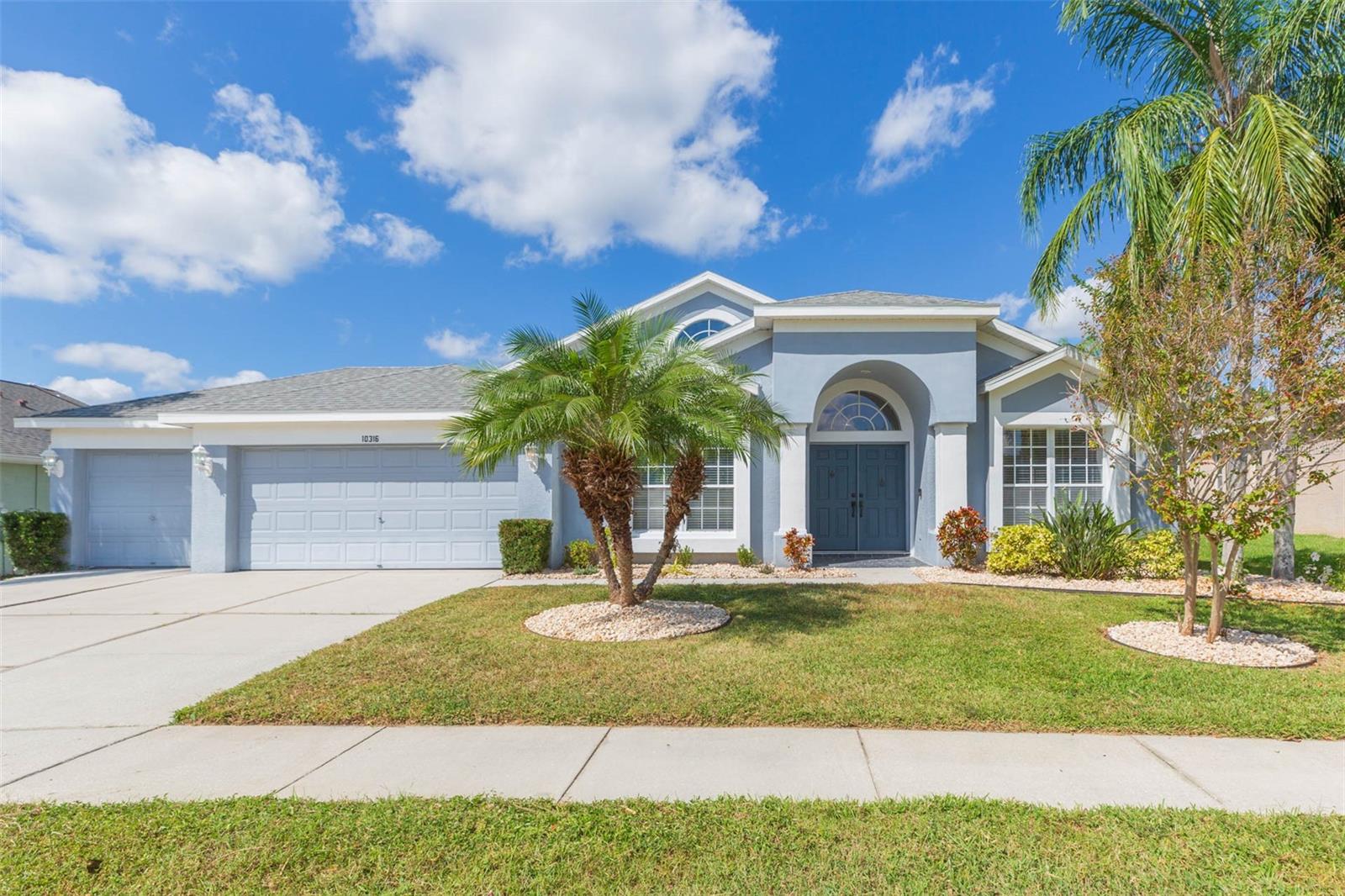 Welcome to the quiet, GATED community of Cross Creek! This 4 bedroom plus den, 3 bath home offers just over 2,500sqft of living space, a 3-car garage, and PRIVATE POOL! Updates include NEW interior paint (2025), AC (2022), Roof (2018), Water heater (2017), and LVP flooring. Entering the grand foyer, you will immediately be drawn to the soaring ceilings and abundance of natural light throughout. French Doors lead into the den, ideal for a home office. The formal dining room flows into the kitchen, complete with a breakfast nook offering both formal and informal dining options. The kitchen has been tastefully remodeled with granite countertops, stainless steel appliances (including a 5-burner gas range!), complementary chrome hardware, and plenty of seating around the island and breakfast bar. The living room boasts a marble and stone-surround fireplace as a cozy focal point and expansive glass pocket sliders, which, when fully open, create true indoor/outdoor living. The backyard is a true, private oasis with the beautifully tiled pool/spa, newly painted surround, and screened-in lanai. Back inside, the primary bedroom has sliding doors with stunning views of the pool, two generously sized walk-in closets, a linen closet, and an ensuite with an oversized vanity with dual sinks, enclosed shower, and a separate soaking tub. Bedroom 2 is ideal for guests or multi-generational living with a large walk in closet and ensuite with direct access out to the pool area. The remaining secondary bedrooms share a full bath. The community of Cross Creek offers Lower HOA fees and NO CDD! Conveniently located in the heart of New Tampa near top-rated schools, shops, and dining.