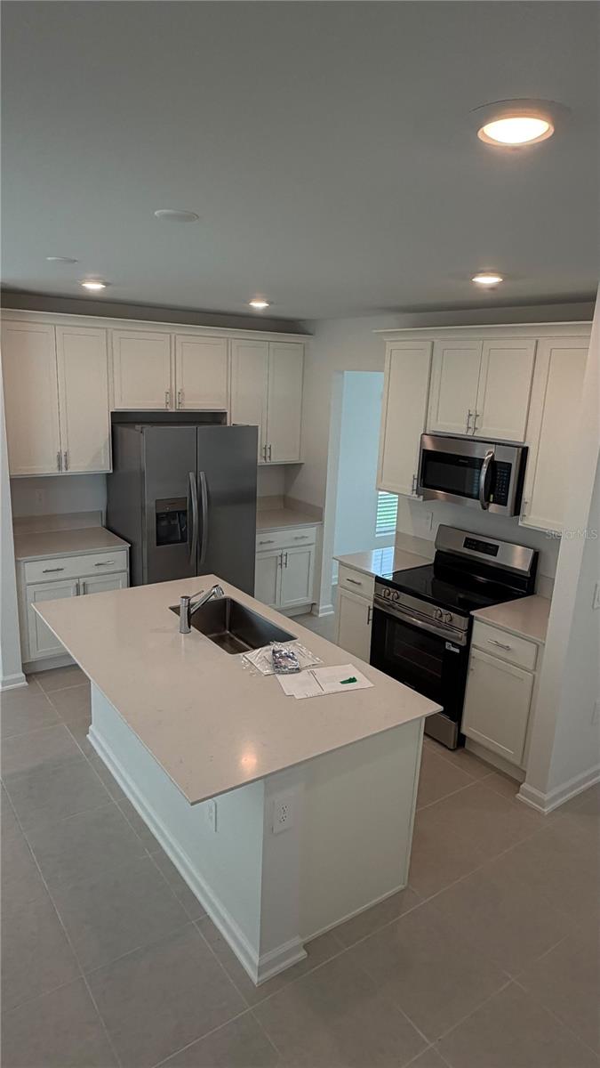 Photo of 6067 Wellbeing Way, Clermont, FL 34711 (MLS # O6445189)