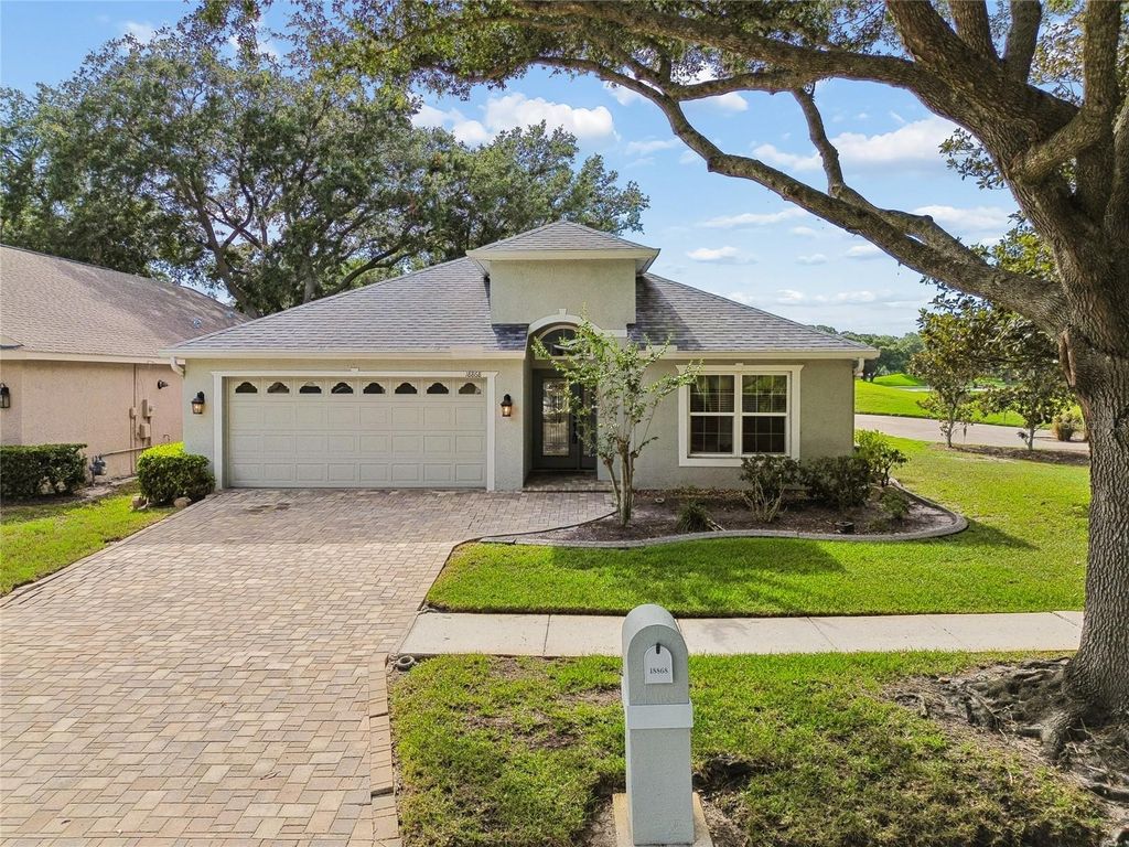 Photo of 18868 Maisons Drive, Lutz, FL 33558 (MLS # TB8521651)