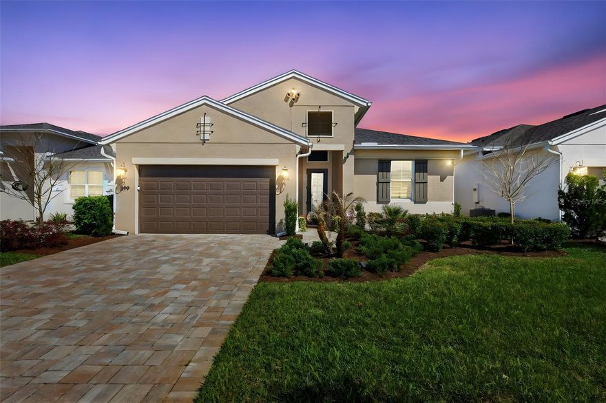 DELAND: Built in 2023, this Julia model home features a bright, open floorplan with soaring 11'4" ceilings and designer upgrades throughout.
Upgrades include: Tray Ceilings, Stone counters, Sold Wood Cabinets, designer light fixtures and water View. Spacious living includes 2 bedrooms, 2 bathrooms, and a versatile flex space ideal for a home office or den.
The gourmet kitchen centrally located and perfect for entertaining, featuring quartz countertops, Stainless steel appliances, matte black fixtures, decorative subway tile backsplash and a large island overlooking the living room. The dining area features Massive 10' tall by 16' wide sliding glass doors that open to a covered lanai which creates a spacious indoor-outdoor flow overlooking serene water views. The primary suite offers a tray ceiling, Ceiling fan and an oversized walk-in closet. The spa-like bathroom boasts dual sinks and a huge walk in shower with wall to ceiling tile. The laundry room has a built in sink and additional storage to make laundry a breeze! The community clubhouse serves as the heart of neighborhood living, offering a FITNESS CENTER, RESORT-STYLE POOL, PICKLEBALL COURTS, PLAYGROUND, AND SOCIAL SPACES designed to bring neighbors together and support a balanced lifestyle. Conveniently located near MAJOR HIGHWAYS, SHOPPING, AND DINING, this home offers the perfect combination of COMFORT, UPGRADES, LIFESTYLE, AND VALUE—a rare opportunity to enjoy a home where the details have already been done for you. Don't wait! Make your appointment today to see all this home has to offer you! **THE INFORMATION IN THE MLS IS THOUGHT TO BE CORRECT, BUT NOT GUARANTEED**