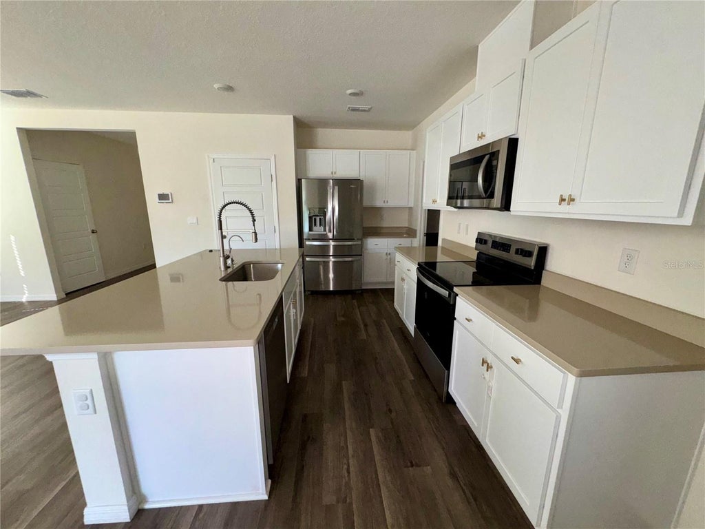 Photo of 2488 Ribbon Fall Avenue, Davenport, FL 33837 (MLS # O6452117)