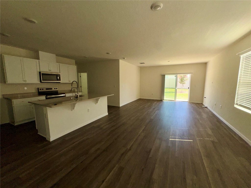 Photo of 2488 Ribbon Fall Avenue, Davenport, FL 33837 (MLS # O6452117)