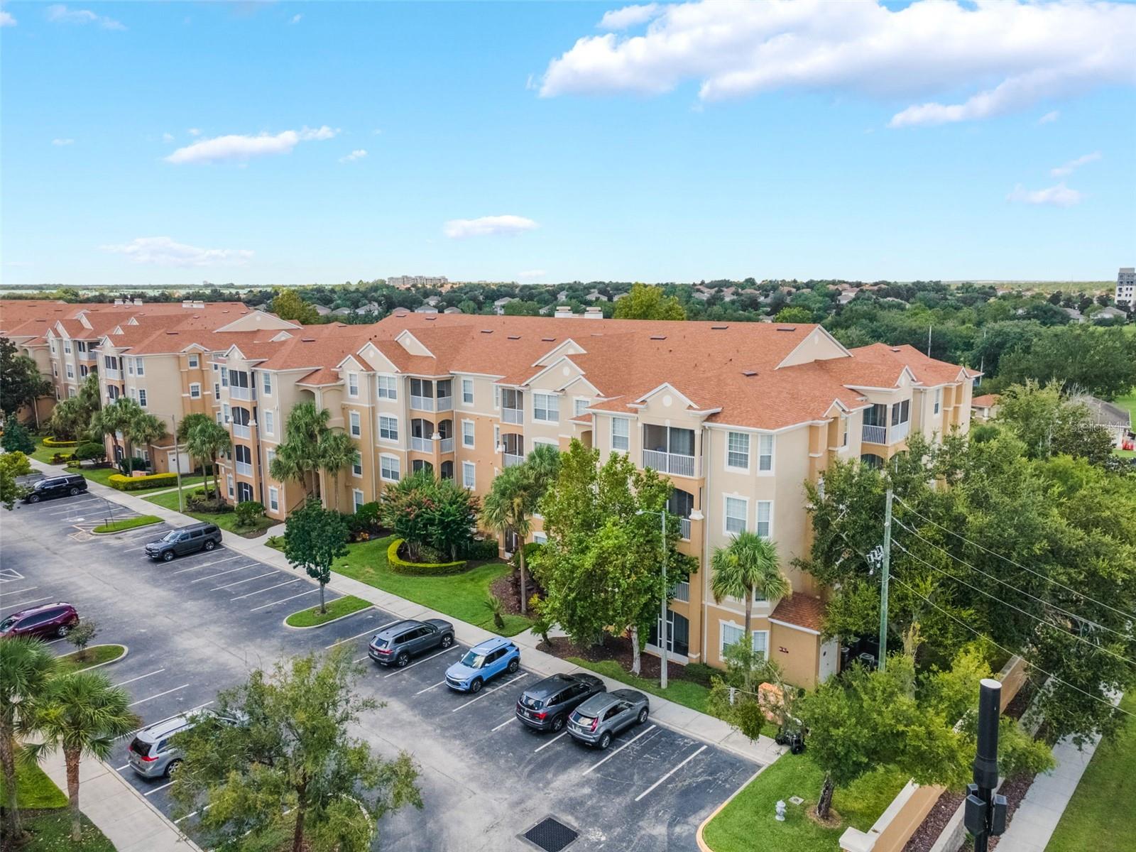 Welcome to this beautifully maintained 2-bedroom, 2-bathroom condo in the sought-after guard-gated Windsor Hills Resort, just 2.5 miles from Walt Disney World! Located on the second floor with convenient elevator access, this fully furnished, turn-key home is ready for immediate enjoyment as a vacation getaway, primary residence, or income-producing short-term rental. Step inside to an open and inviting layout featuring a spacious living and dining area, well-equipped kitchen, and a private screened-in balcony—perfect for relaxing after a day at the parks. Recent updates include a new AC and water heater, offering peace of mind for years to come.
Windsor Hills Resort is known for its world-class amenities, including a lagoon-style pool with water slides, splash pad, hot tub, fitness center, game room, movie theater, and on-site store. HOA fees cover cable, internet, water, trash, landscaping, security, and more. With its unbeatable location, modern comforts, and strong rental potential, this property is a true gem in one of Central Florida’s most desirable vacation communities.