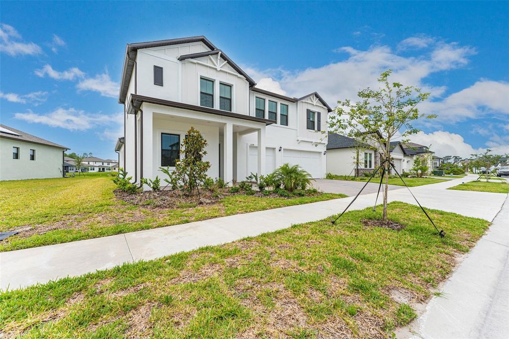 Photo of 21378 Snowy Orchid Terrace, Land O Lakes, FL 34637 (MLS # TB8454938)