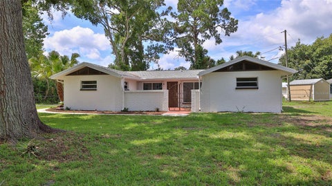 Photo of 2212 Woodland Drive, Edgewater, FL 32141 (MLS # NS1088427)