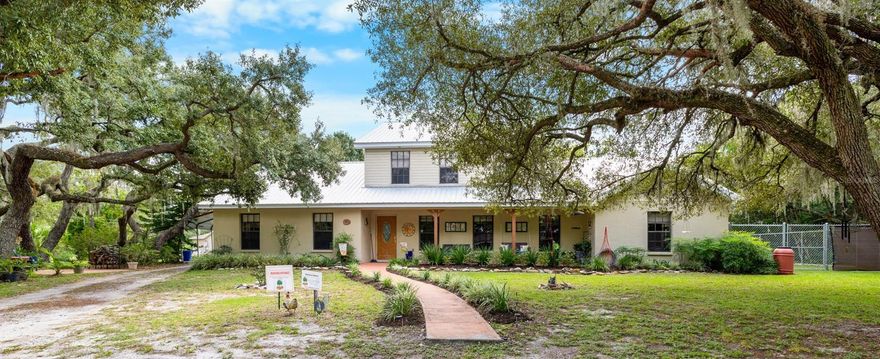 Truly One-of-a-Kind Home and Business Opportunity!
Discover endless possibilities with this unique 4-bedroom, 3-bath home on 2.67 acres, complete with 1200 square feet 5-car garages, two addresses, and a long-established pet-sitting business (20+ years). The property can potentially be split, offering flexibility for expansion, investment, or continued business use.
Enjoy country living with city conveniences on this fully fenced corner lot featuring an electronic gate entrance and two additional gated entries. Beautifully landscaped with mature trees, cleared areas, and space for all your toys. Relax by the screened-in pool and spa, or unwind under the backyard gazebo.
Inside, you'll find generously sized bedrooms, a large inside laundry/utility room with abundant storage, and a storm-reinforced storage closet. The spacious in-law apartment offers its own full kitchen with island, open living and dining area, full bath, large bedroom, and a porch overlooking the pool and yard — perfect for guests, extended family, or rental income.
Additional features include two carports, multiple storage areas, a chicken coop, and plenty of parking. Sit and relax on the welcoming front porch, take in the peaceful setting, and envision all the potential this property offers.
Zoned AR, with possibility for conversion to commercial use — offering excellent Little Road frontage and convenient access to the Suncoast Parkway and US 19 for an easy commute throughout the Tampa Bay area.
Endless opportunities — live, work, and thrive on this incredible property! Don’t miss out on this rare