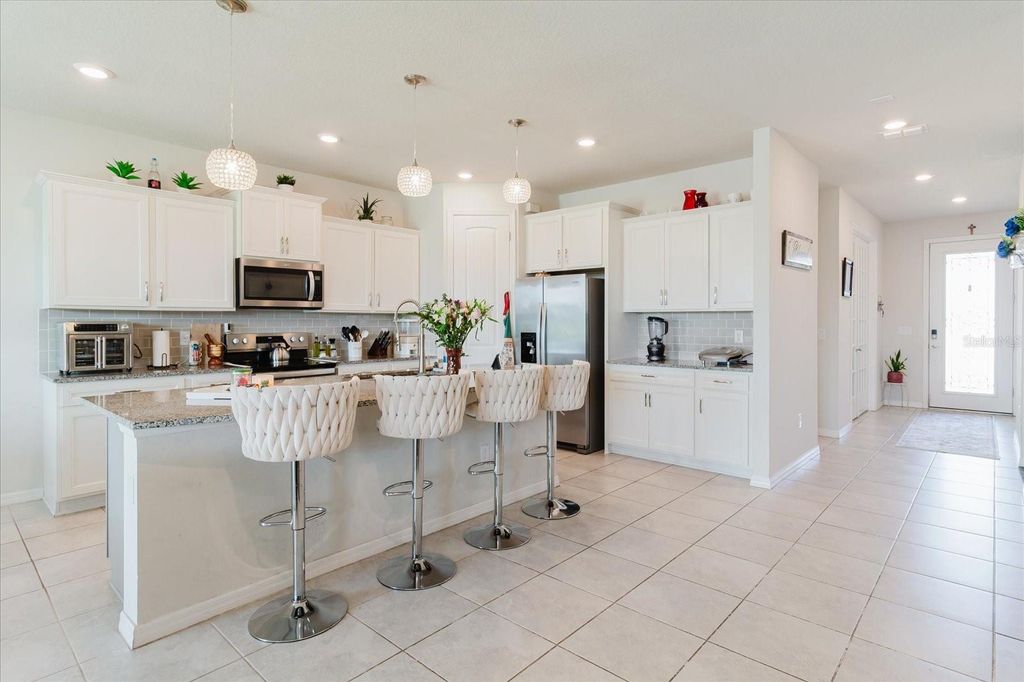 Photo of 10307 Wine Press Avenue, Riverview, FL 33578 (MLS # TB8494048)
