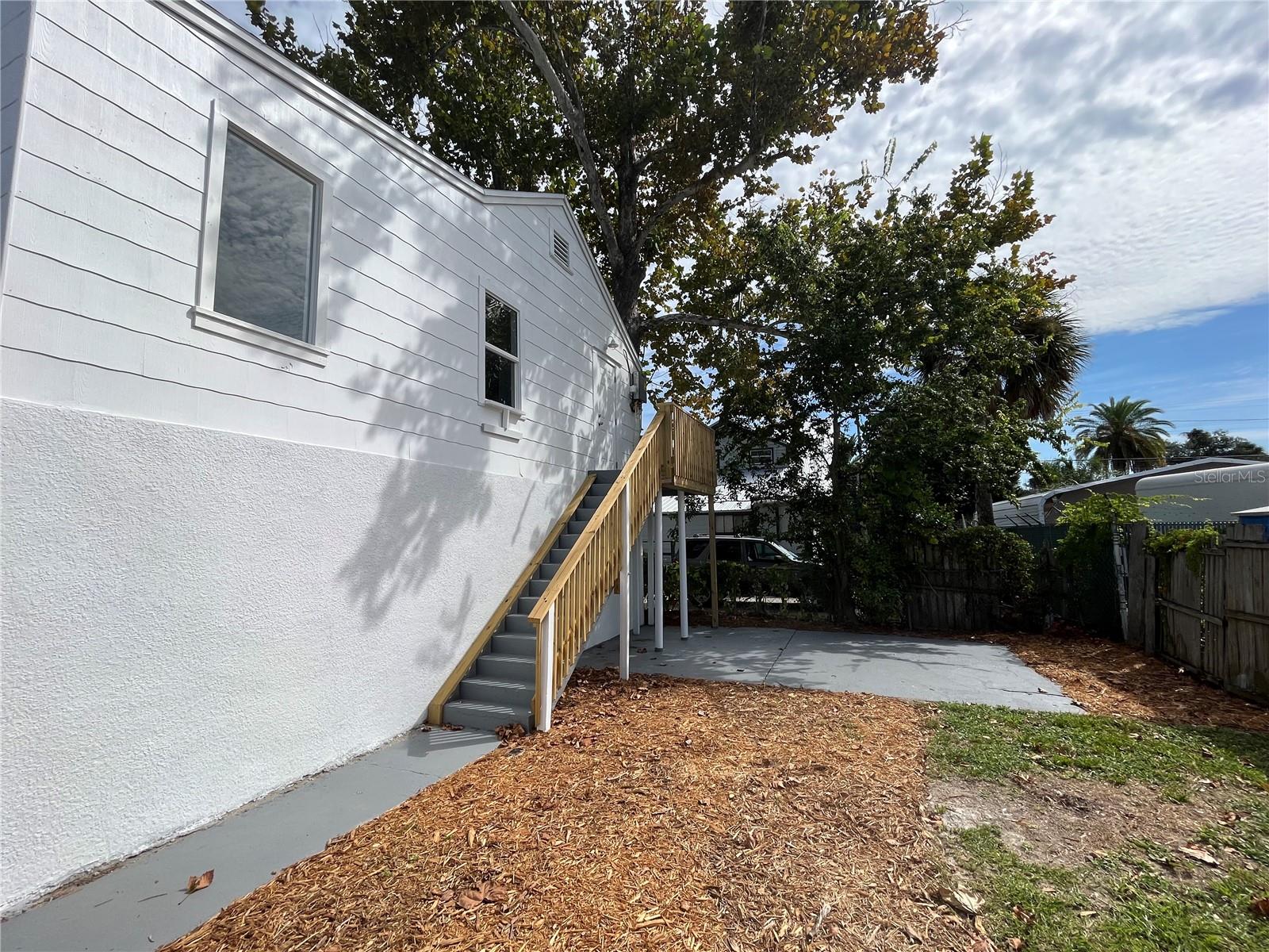 Apartment B (back upper level unit) is 1 bedroom 2 bathroom. Extra room can be used as office or bedroom. $1300 monthly. Annual lease only. One assigned parking spot. Water bill is is included in rent. Tenant will put gas and electric bill in tenant name. Please drive by and call for additional information. Apartment is behind the house. Available August 1, 2025.