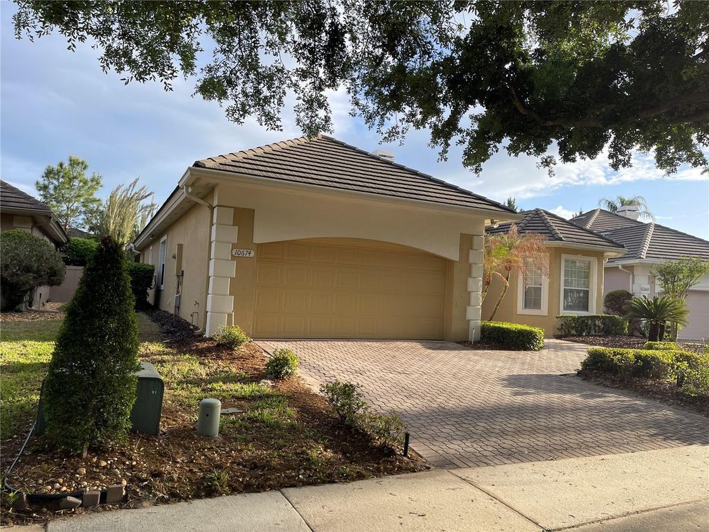 Photo of 10674 Woodchase Circle, Orlando, FL 32836 (MLS # O6395686)