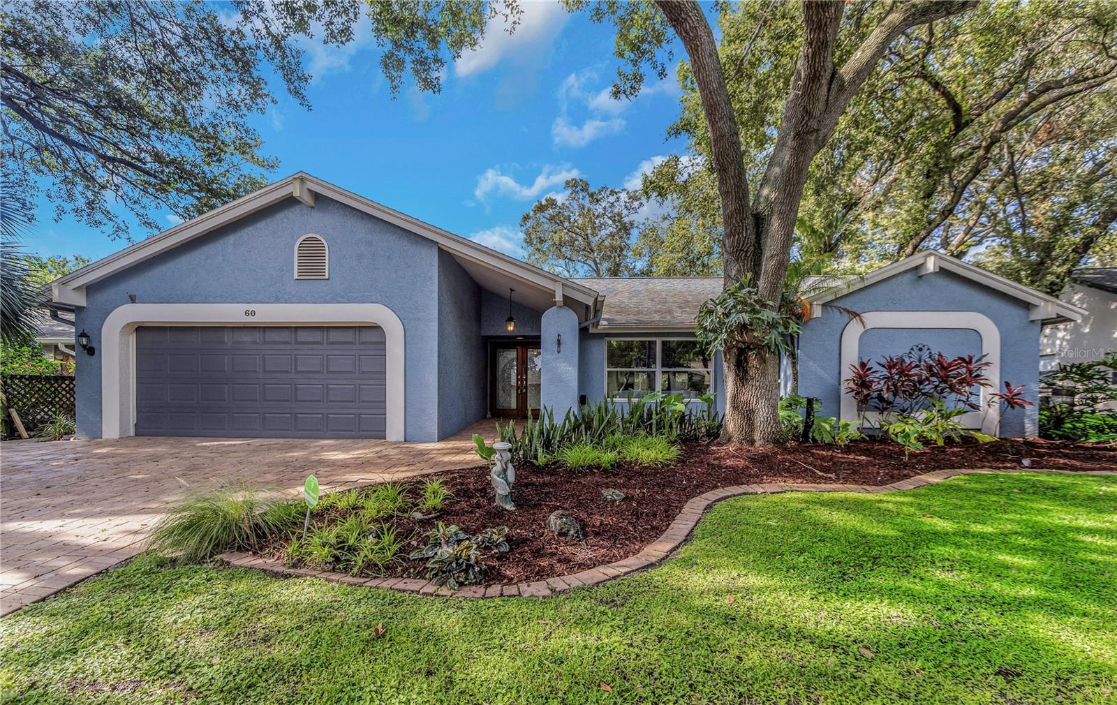 Welcome to 60 Crane Drive—a well-maintained 4-bedroom, 2-bath pool home in the heart of Safety Harbor. This split floor plan has been updated throughout and offers a solid mix of style and function. You’ll find hardwood and travertine floors throughout the home. The spacious kitchen has custom crafted quarter sawn cabinets, granite counter-tops, a new cooktop and dishwasher as well as an island and eat-in kitchen overlooking the pool through new french doors.
Other updates include a brand-new AC system with air purification, a new air handler, newer roof (2018), fresh paint throughout, and new hurricane rated french doors leading to the screened-in pool area. A perfect location in a quiet well-maintained neighborhood. Located in a golf cart-friendly neighborhood just minutes from Downtown Safety Harbor’s restaurants, shops, and waterfront—this home is move-in ready and easy to enjoy.