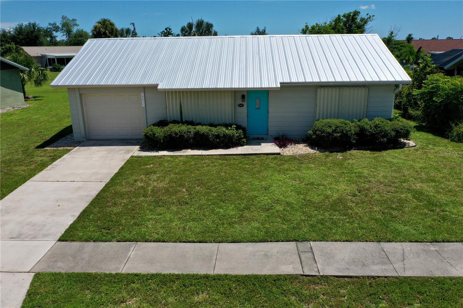 Welcome home to Gardens of Gulf Cove, a 2 Bedroom, 1 Bathroom, SINGLE FAMILY home community with a very low ($470) yearly HOA fee!!! This home comes FURNISHED so you can just bring your bathing suit and relax in one of the two community POOLS (one is heated) or take a quick 15 minute drive to either Englewood BEACH or Boca Grande!! With underground utilities and city water/sewer, this adorable home sits in the back corner of the community so lots of PRIVACY and perfect for a seasonal get-a-way. The flooring is all new with gorgeous ceramic tile throughout and it's been freshly painted both inside and out!! The master bedroom is very spacious with plenty of closet space. The kitchen is spacious and functional with an eat in dinette area adjacent to the sliders leading to the back screened-in lanai where you can enjoy your morning coffee! The back yard is spacious and partially fenced as well. This home also comes equipped with hurricane shutters! This neighborhood is close to shopping, grocery and dining. If you like to boat or fish, there are several boat ramps and piers close by! In addition, there are an abundance of nearby golf courses if that's your thing! There is also a 9 mile bicycle/multi-use path nearby that meanders through Cape Haze towards Boca Grande. The community association has plenty of fun activities during season here....you also have access to the Clubhouse where there are pool tables, a library, board games and card tables. There are also tennis courts (or use them for Pickleball), a basketball court, bocce and shuffleboard, plus a storage area is available upon availability for your boat or RV (an extra $150/ year each)!!