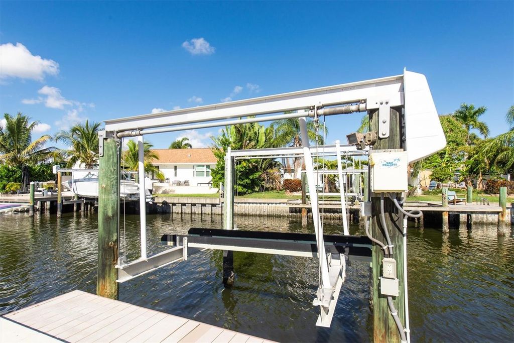 Photo of 9453 Treasure Lane NE, St Petersburg, FL 33702 (MLS # TB8463125)