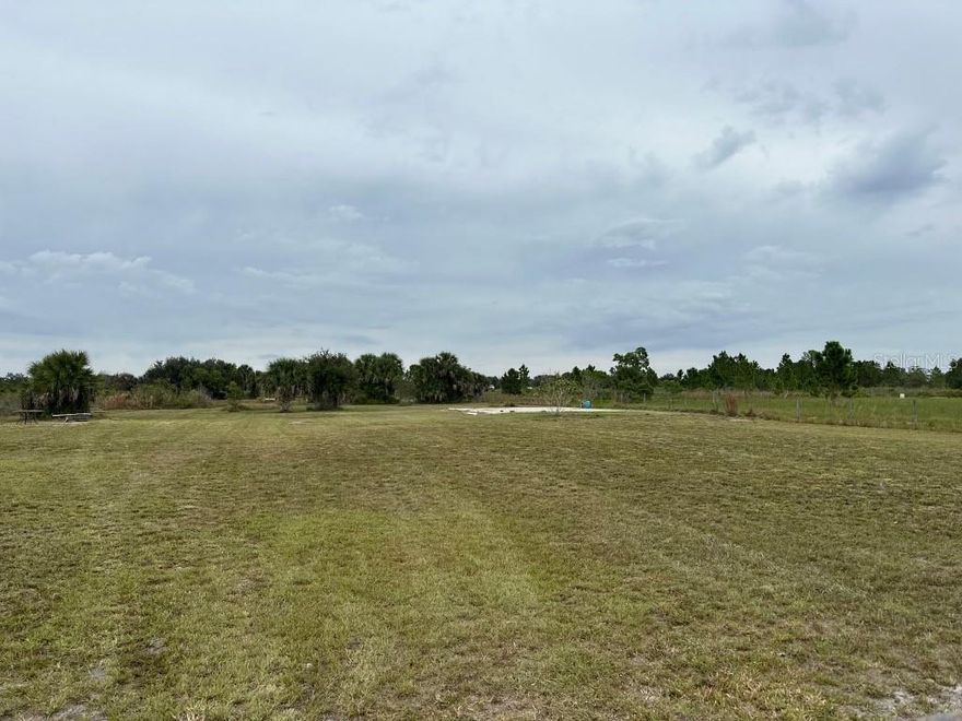 Check out this amazing 1.25- acre Parcel located in the Okeechobee Prairie! Upgrades include cleared, fully fenced with 3-16" gates, a 45'x45' concrete RV pads, and a 15' x 20' concrete pad, Well, Pump, Pressure tank, shell rock driveway, culvert, and a large shooting berm, for weekend entertainment. So, whether you are looking to escape the busy city life, build the home of your dreams or just a place to get away for the weekend, look no further! Call Today!