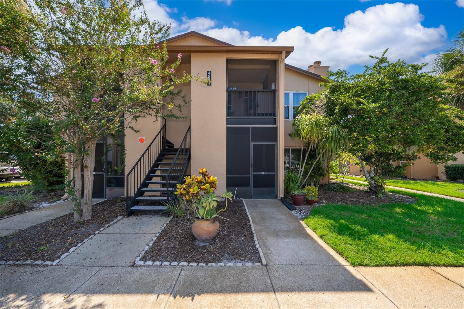 Discover easy living in this 2-bedroom, 2-bath first-floor condo located in Southbrooke Community! This move-in ready condo offers a comfortable layout with updated windows, ceramic tile and laminate flooring throughout (no carpet!), and a cozy fireplace for relaxing evenings. The primary suite features a refreshed walk-in shower, and the building’s roof was replaced in 2022 for added peace of mind. You’ll love being just minutes from Orlando International Airport, plenty of shopping and dining options, and with quick access to major roads and highways to get anywhere you need to go. Perfect for a first home or investment!