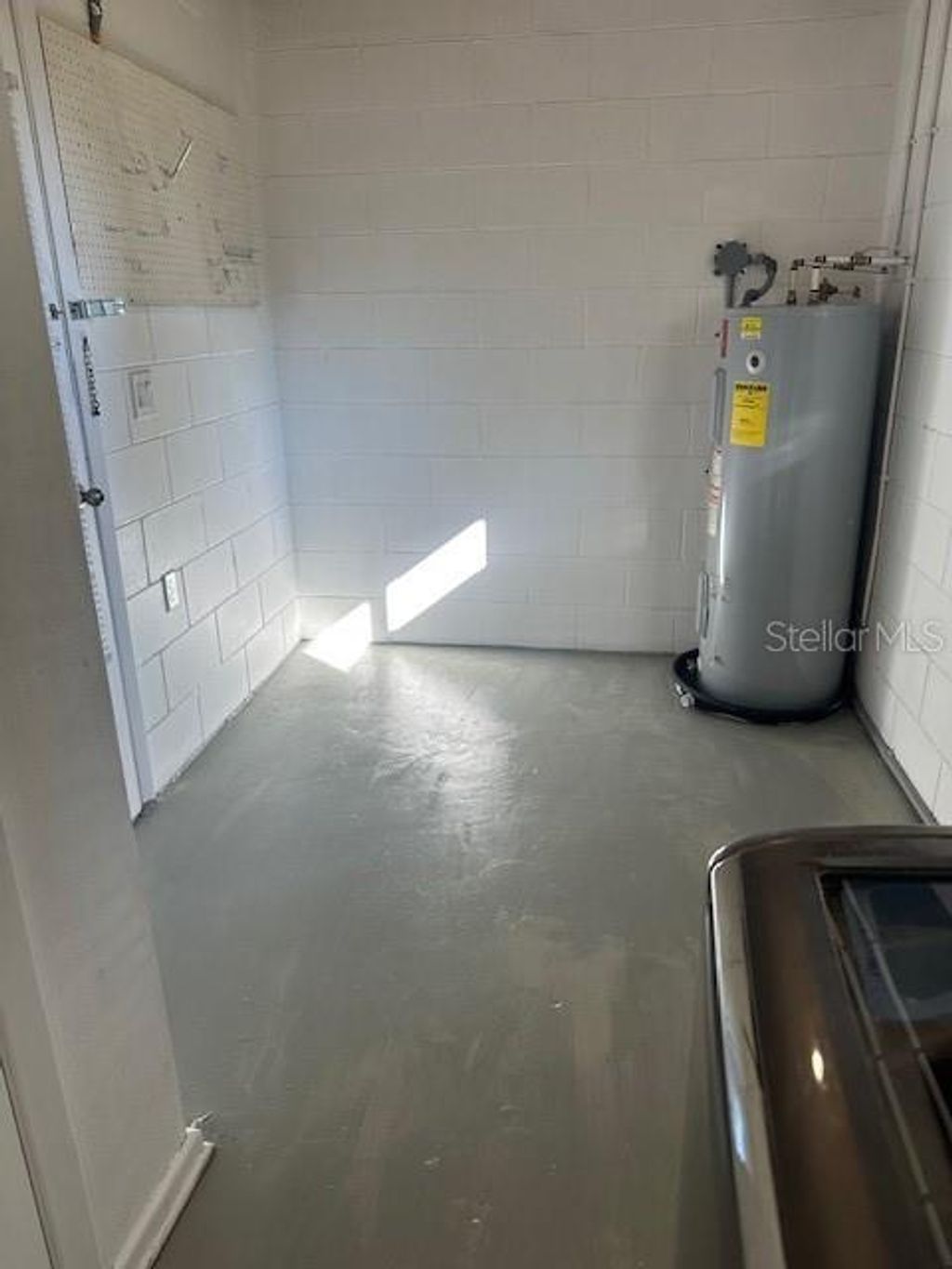 Photo of 1714 Mosher Drive, Orlando, FL 32810 (MLS # S5139199)