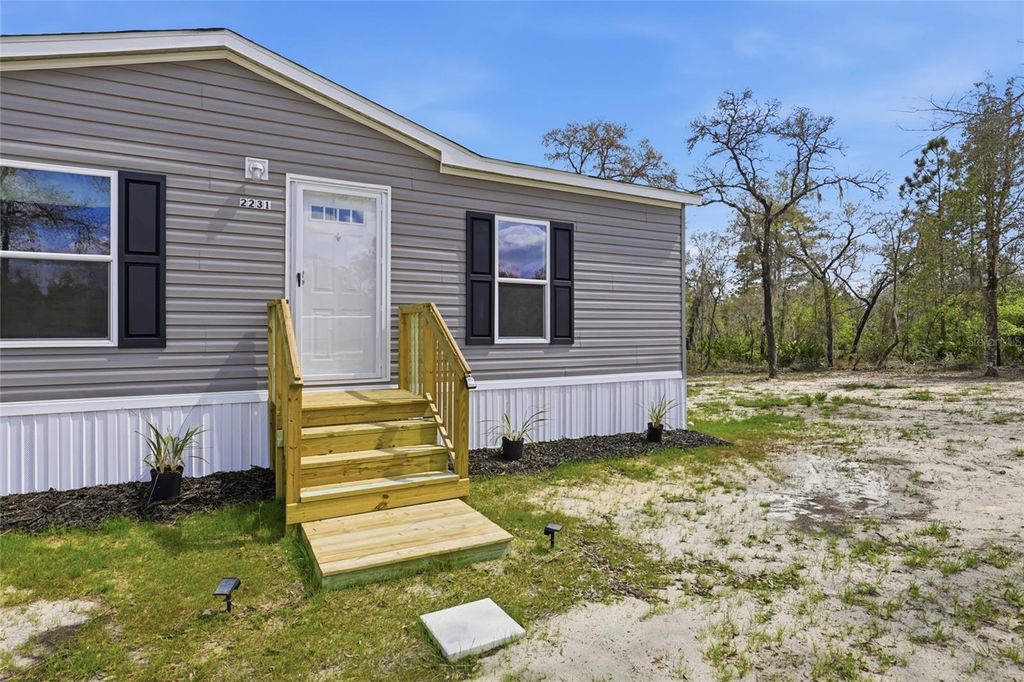 Photo of 2231 SE 132nd Court, Morriston, FL 32668 (MLS # GC538636)