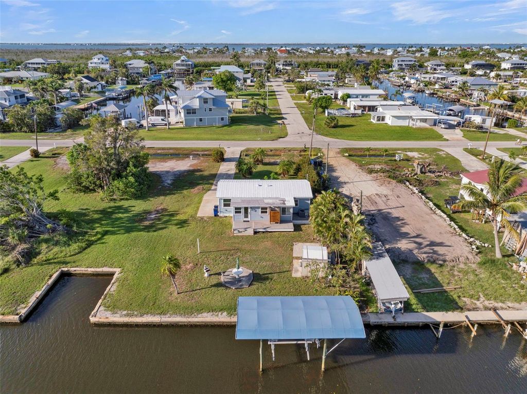 Photo of 2880 8th Avenue, St James City, FL 33956 (MLS # C7520512)