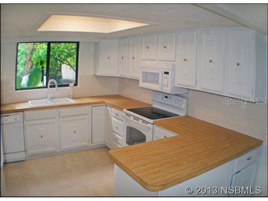 NEWLY REMODELED KEY WEST STYLE BEACH HOUSE- VERY LOW MAINTENANCE AND LOW HOA ONLY $143/MONTH! Metal roof, Caribbean colors, white vinyl privacy fenced yard, extensive tropical landscaping. A short walk to the best beach in Central Florida. Only 1-block to Indian River Lagoon Preserve Park to go fishing, kayak, and view manatees and dolphins. Interior remodeled in 2013: ALL NEW APPLIANCES, NEW LAMINATE WOOD FLOORS, NEW TILE FLOORS AND BATHROOMS, ALL NEW DOORS AND FRESHLY PAINTED WALLS. Exterior Hardi-panel walls with stucco finish have 50 year warranty- resists mold & termites. LOW HOA covers insurance and maintenance. AFFORDABLE, RENTABLE, & BEAUTIFUL!!  Your newly remodeled beach house is ready to move in today! ;Water: City