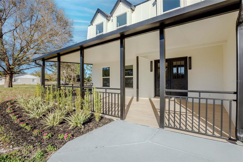 Photo of 3324 Haystack Road, Wesley Chapel, FL 33543 (MLS # O6385931)